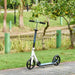 White kids folding kick scooter with adjustable height on a park pathway