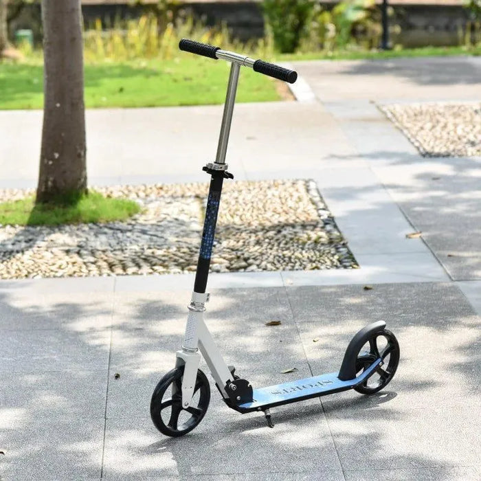 White kids folding kick scooter with adjustable height on outdoor pavement
