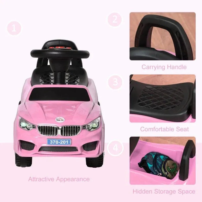 Pink kids foot-to-floor ride-on car with steering wheel, handle, seat, and storage compartment
