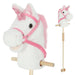 Plush unicorn toy with pink mane and reins on a white background