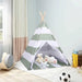 Children's teepee tent with toys inside in a room setting
