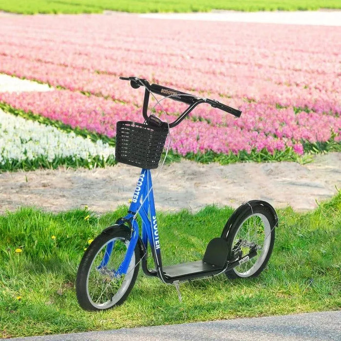 Blue and black kids kick scooter with basket and adjustable handlebar on grass by flower field