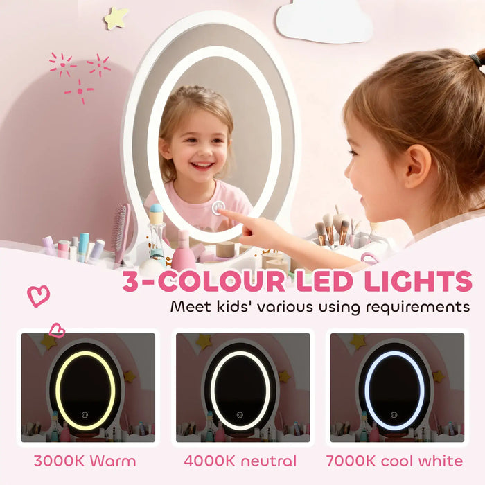 Child looking at a round mirror with LED lights, surrounded by beauty products on a pink background.