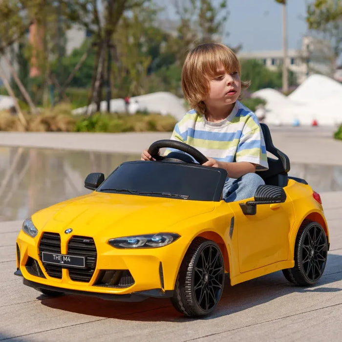 Kids Licensed BMW M4 with Easy Transport, Remote Control, Suspensions, Music, Horn and LED Lights in Yellow 12V - Little and Giant Explorers AIYAPLAY