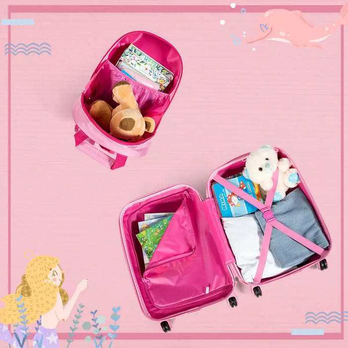 Pink suitcase with compartments filled with toys and clothes on a pink background