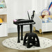 Kids black mini grand piano with LED lights, microphone, and matching stool on polka dot rug