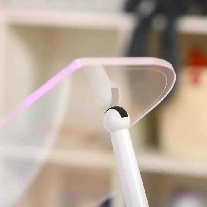 Close-up of white mini grand piano lid with LED lights, children's electronic keyboard