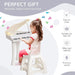 Child playing white kids mini grand piano keyboard with LED lights, suitable for ages 3-6