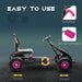 Pink and black kids pedal go kart with hand brake, anti-slip foot pedals, and sturdy tires.