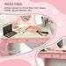 Kids pink vanity table with animal design, acrylic mirror, makeup set, drawer, and storage.