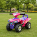 Pink and purple kids ride-on quad bike toy on green grass in a park setting