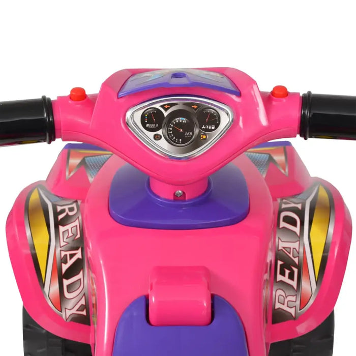 Pink and purple toy ATV handlebars with dashboard gauges and READY decals
