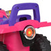 Close-up of pink and purple ride-on toy car rear with large wheels and tail light