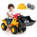 Child playing with a toy bulldozer, wearing a hard hat and holding rocks.