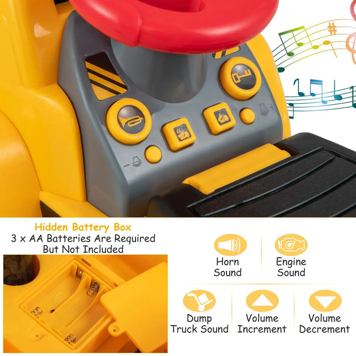 Toy dump truck with control panel, buttons, and sound features on a white background.