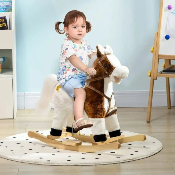 Toddler riding brown and white cowboy-themed rocking horse toy on polka dot rug indoors