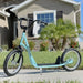 Blue and black kids scooter with adjustable handlebar and dual brakes on sidewalk
