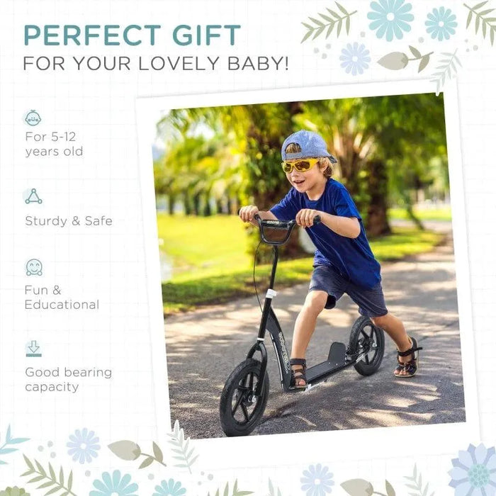 Boy riding black kids scooter with adjustable height and wide deck outdoors