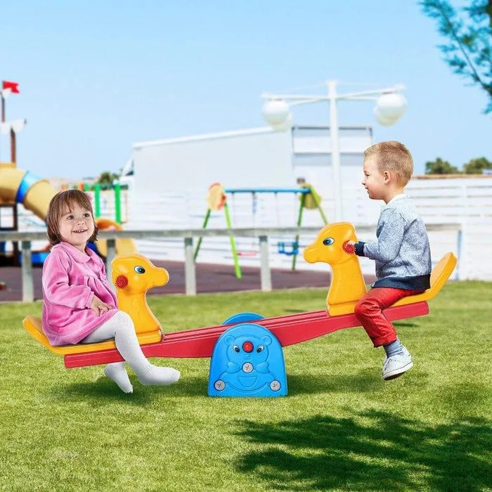 Kids playing on animal design adjustable height seesaw in outdoor playground