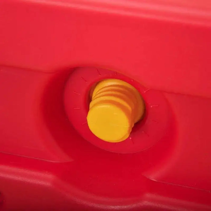 Close-up of yellow plastic adjustable knob on red seesaw frame for kids