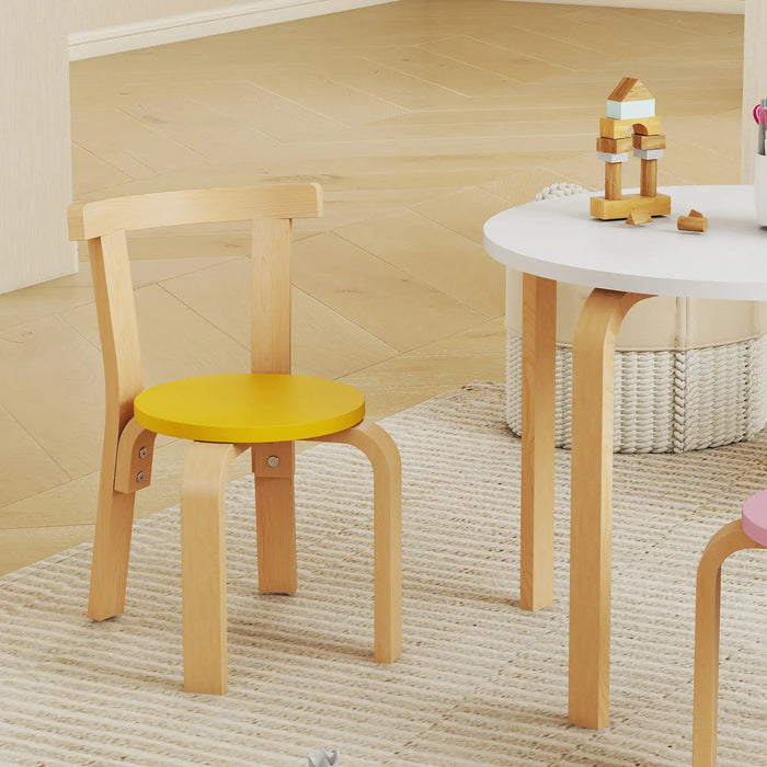 Wooden chair with a yellow seat next to a small round table in a room.