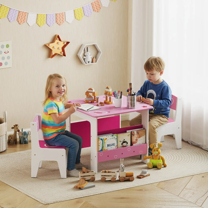 Two kids playing at pink and white children table with wooden blocks, books, and toys in bright playroom