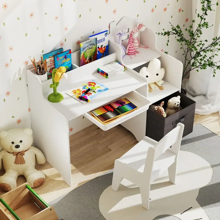 Children's desk with toys and books in a room with floral wallpaper