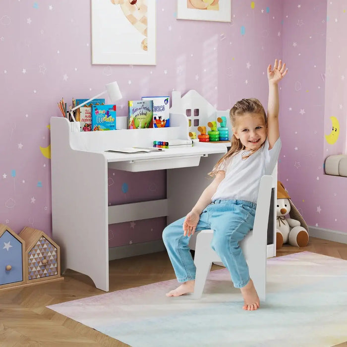 Child sitting on a white chair in a room with a purple wall and toys.