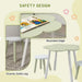 Green and white flower-shaped kids table and chair set with sturdy legs and rounded edges