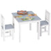 Grey and white kids table and chair set with children's books on tabletop