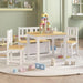 Kids white and beige table chair set with storage bench, play blocks in playroom