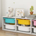 Children's toy storage unit with colorful bins and toys on a wooden floor.