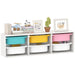 White shelf with colorful storage bins and decorative items on a white background