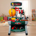 Kids toy workbench with plastic helmet, saw, tools, and accessories in a playroom setting