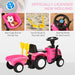 Pink kids ride-on tractor with cargo box, sand fork, shovel, and steering wheel features.