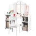 White children's vanity table with mirror and shelves on a white background