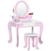 Kids pink and white vanity table with mirror, matching stool, drawer, and princess design.