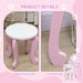 Pink and white kids vanity stool with curved legs, detailed product view on wooden floor