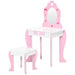 Pink and white kids vanity table with mirror, heart shapes, and matching stool