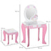 Kids vanity table set with pink unicorn theme, oval mirror, matching stool, and dimension labels