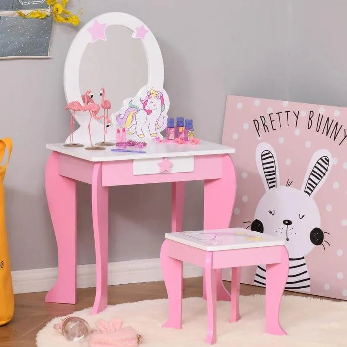 Kids pink vanity table set with oval mirror, unicorn decor, and matching stool in bedroom