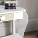 white kids vanity table with green flower drawer and palette on top