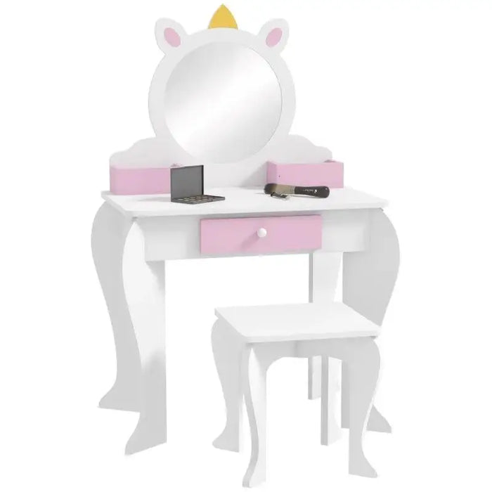 White kids vanity table with unicorn mirror, pink drawer, stool, and storage compartments