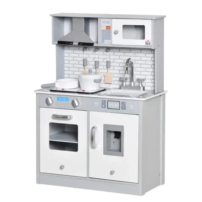 Kids wooden kitchen playset in grey and white with marble countertop and toy appliances
