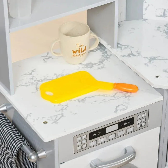 Kids wooden kitchen playset countertop with yellow toy cutting board and mug