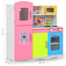 Colorful wooden toy kitchen set with fridge, oven, sink, and brick-patterned backsplash