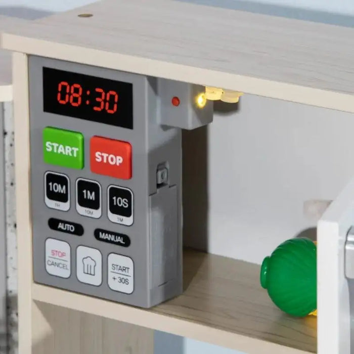 Kids wooden kitchen playset with digital timer, start and stop buttons, and toy food item