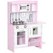 Kids pink and white wooden kitchen playset with toy clock, sink, storage, and utensils