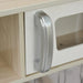 Close-up of toy kitchen playset cabinet with silver handle and wood grain finish