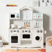 White wooden kids pretend kitchen set with stove, microwave, sink, washing machine, and hanging utensils